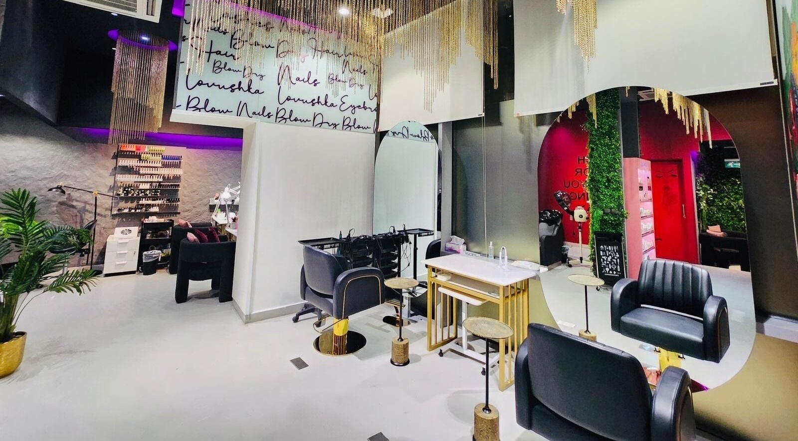 Luxurious interior of Lovushka Beauty Salon in Doha, Doha Municipality, QA featuring chic black seating and decor.