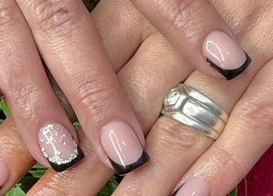 Elegant black-tipped nails at Noelin Artistry Studio, Pretoria, Gauteng, ZA. Stylish and modern design.