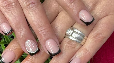 Elegant black-tipped nails at Noelin Artistry Studio, Pretoria, Gauteng, ZA. Stylish and modern design.