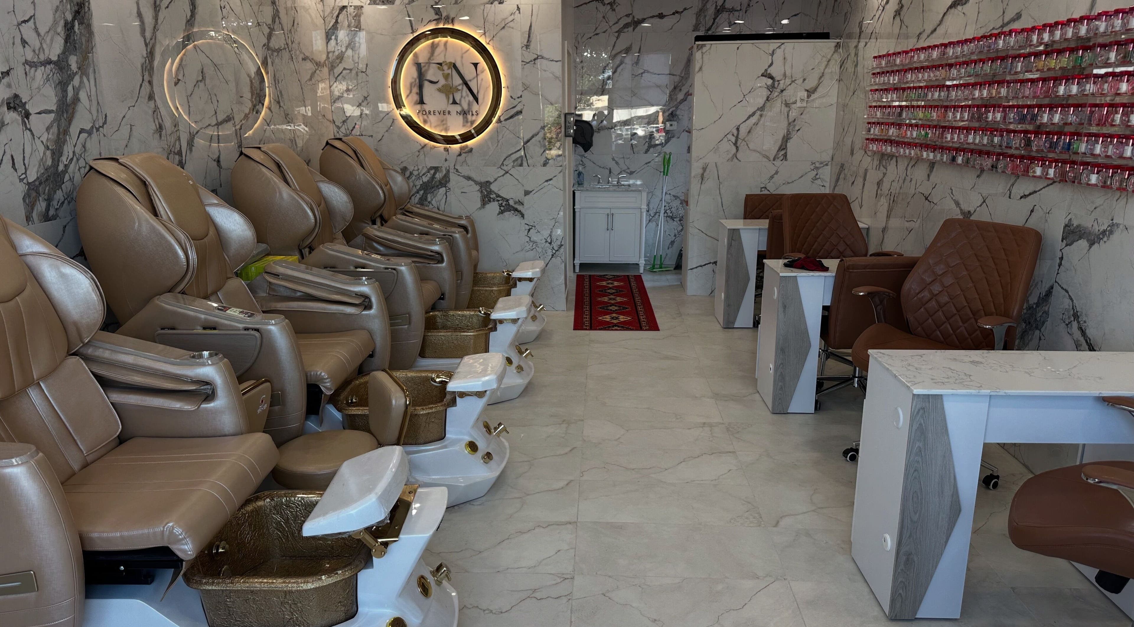Luxurious pedicure chairs at Forever Nails, Pickerington, Ohio, US invite relaxation and pampering.