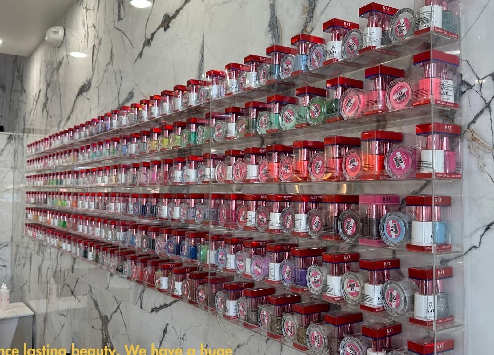 Diverse nail polish collection at Forever Nails, Pickerington, Ohio, enhancing beauty options with vibrant colors.