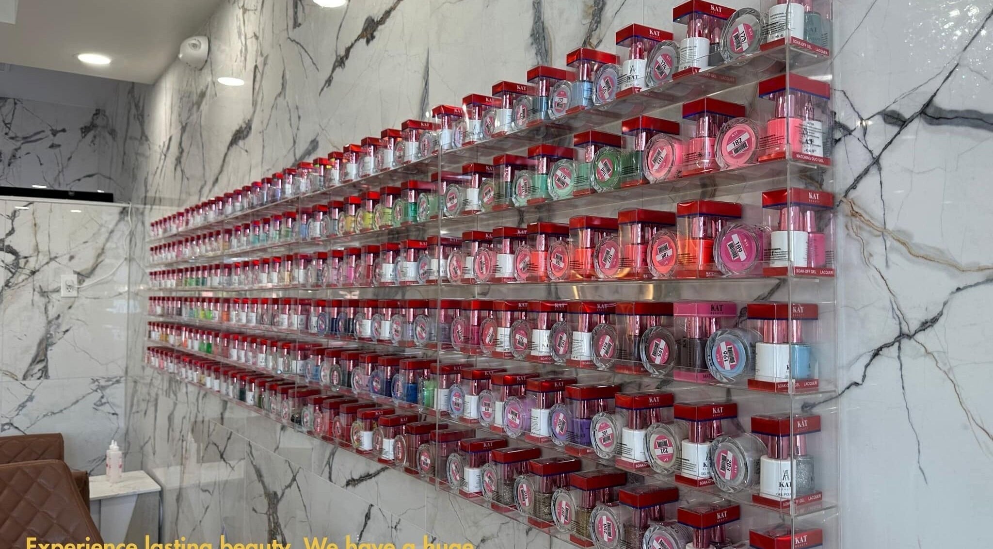 Diverse nail polish collection at Forever Nails, Pickerington, Ohio, enhancing beauty options with vibrant colors.