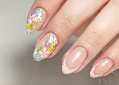 Floral nail art at The Cedar Tree Nails Salon | Portage, Winnipeg, Manitoba, CA, showcasing delicate designs.