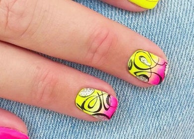 Bright nail art at The Cedar Tree Nails Salon | Portage, Winnipeg, Manitoba, CA, showcasing intricate neon designs.