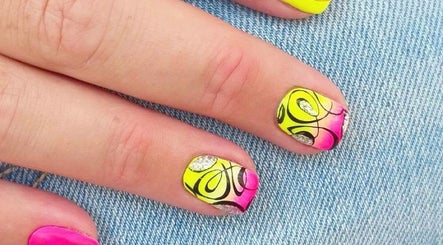 Bright nail art at The Cedar Tree Nails Salon | Portage, Winnipeg, Manitoba, CA, showcasing intricate neon designs.