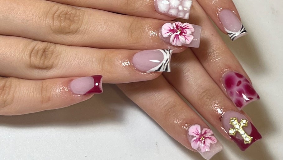 Elegant floral nail art at Muse Sculpt Studio, Wolverhampton, England, GB showcasing intricate designs.