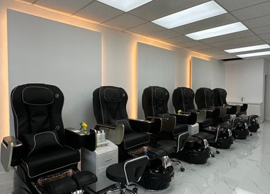 Row of premium pedicure chairs at Sunny Nails Guelph, Guelph, Ontario, CA, offering a luxurious pampering experience.