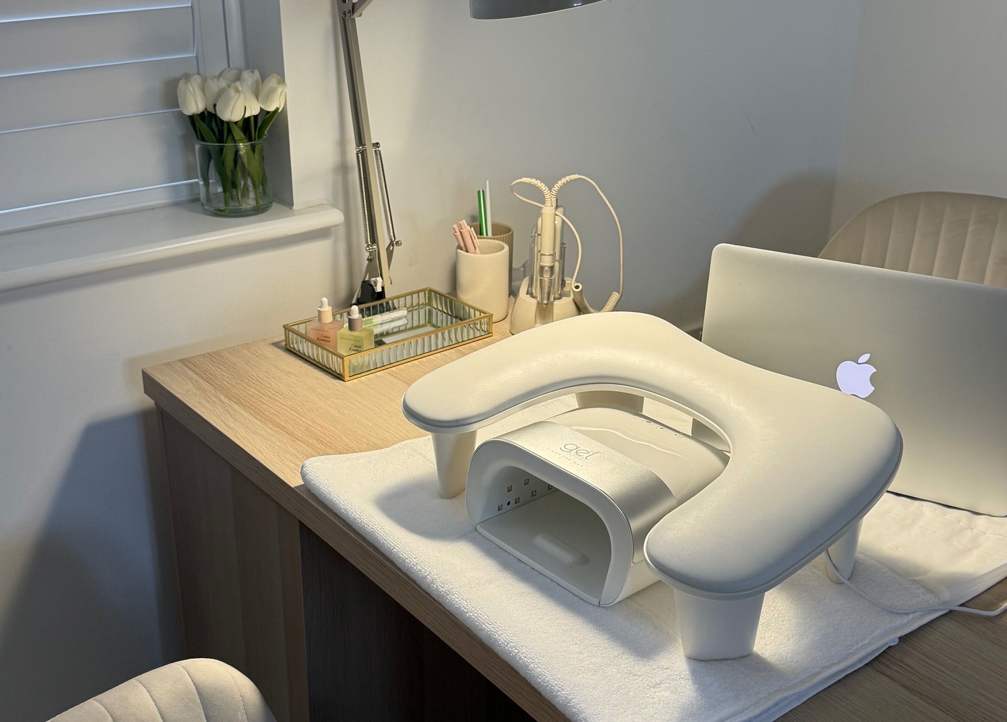 Modern nail station at BAJE STUDIO, Burgess Hill, England, GB with elegant decor and professional setup.