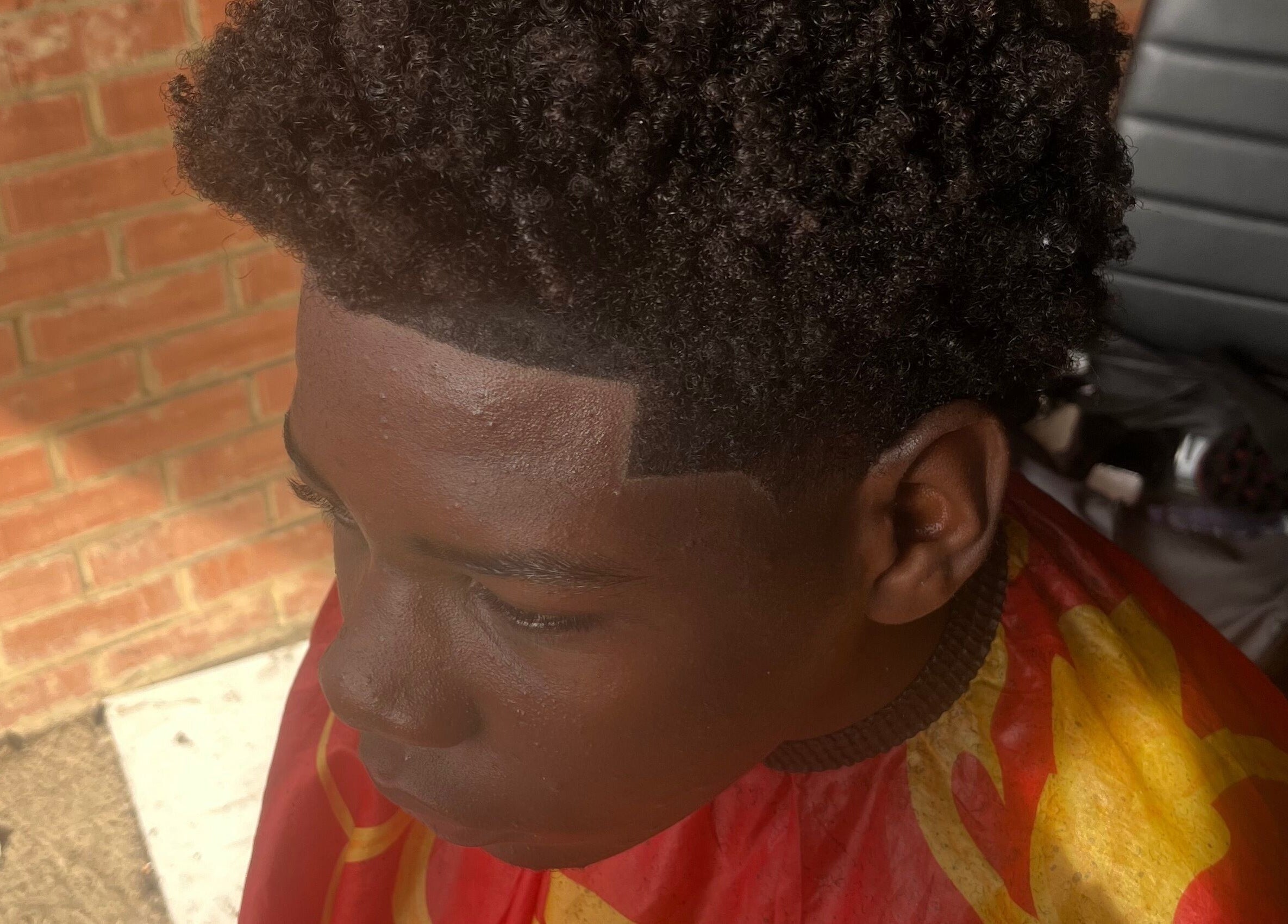 Fresh haircut at kcutz in Welwyn Garden City, England. Showcasing precision styling and expertise.