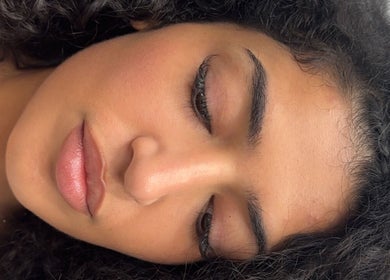 Relaxed person in a peaceful setting at Wellness Spa, Montréal, Québec, CA, enjoying tranquility.