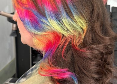 Vibrant rainbow hair styling at Pins & Curls, Weston-super-mare, England, GB for bold beauty statements.