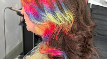 Vibrant rainbow hair styling at Pins & Curls, Weston-super-mare, England, GB for bold beauty statements.