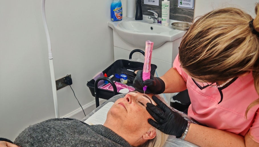 Microblading session at Luxe Ink, Motherwell, Scotland, GB, enhancing client's eyebrow beauty and symmetry.