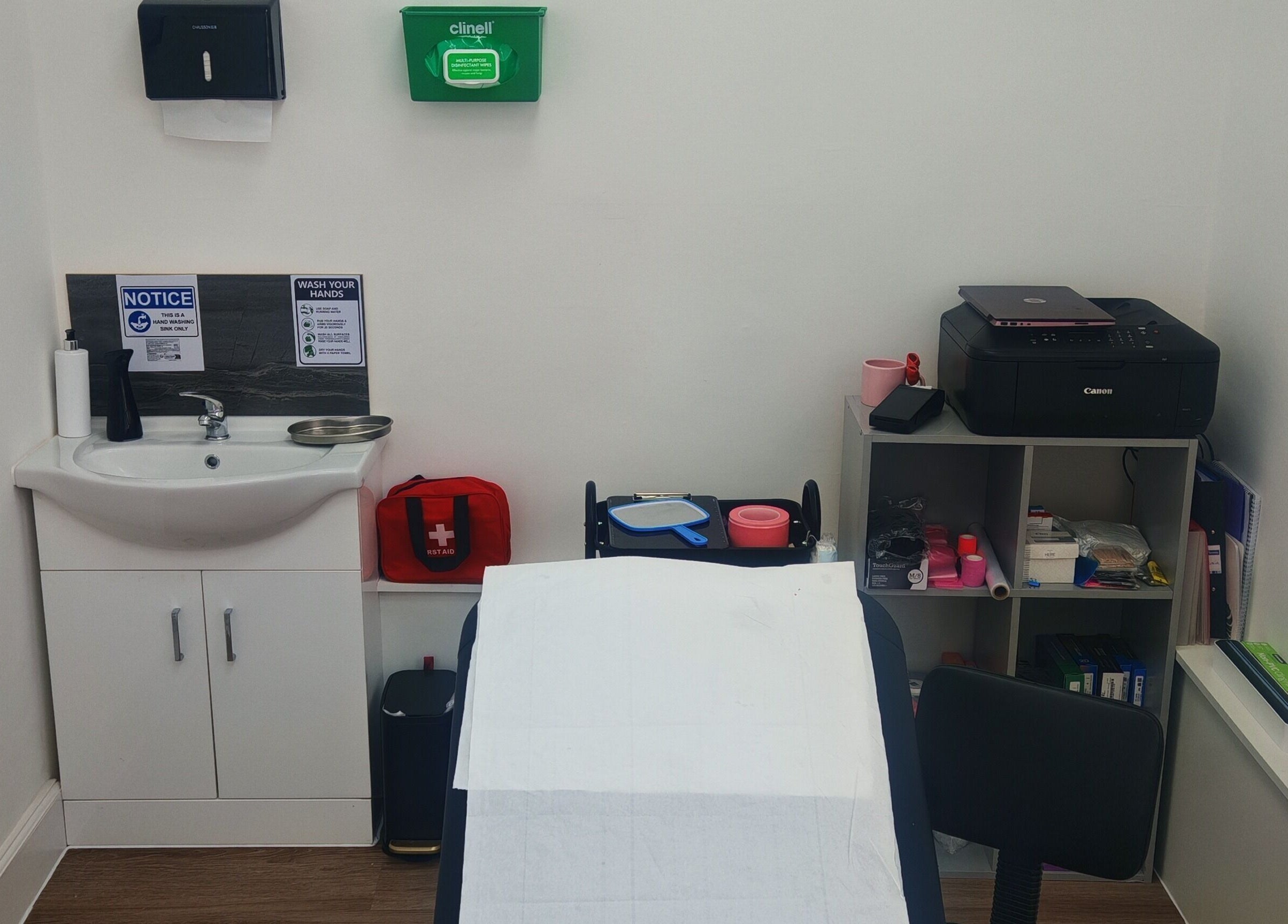 Treatment room at Luxe Ink with sink and supplies, Motherwell, Scotland, GB.
