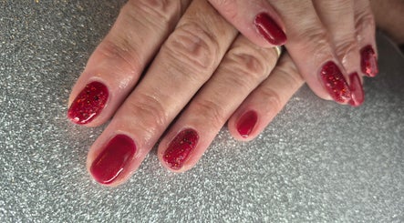 Elegant red glitter manicure from Nailed it! By Rachel in Irchester, England, GB.