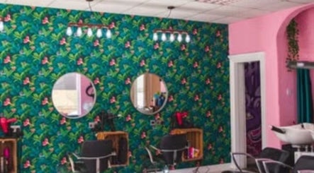 Vibrant floral salon decor at Hair_by_faith_s in Liversedge, England, GB featuring stylish styling chairs.
