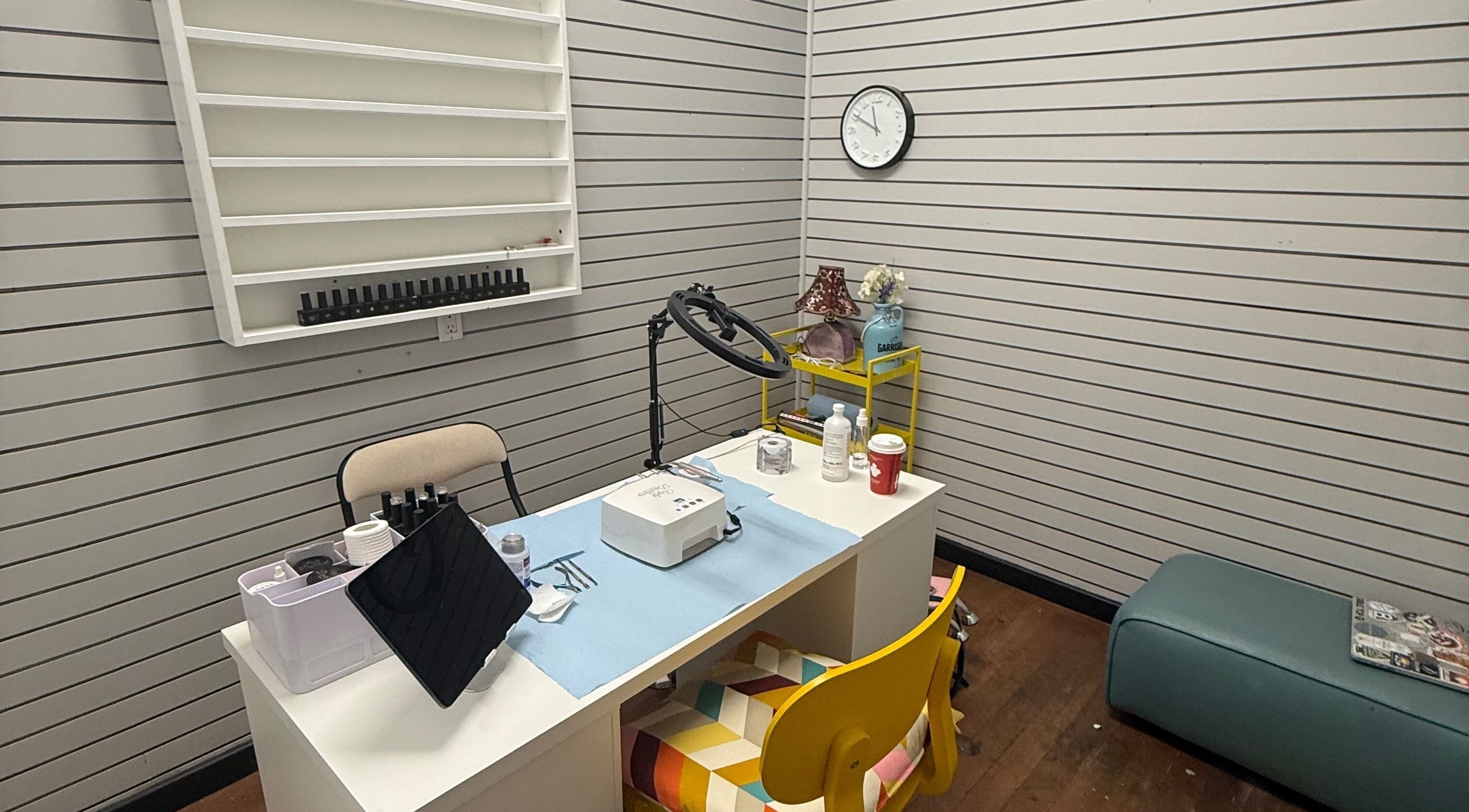 Cozy nail salon setup at Rebel Claws, Revelstoke, British Columbia, CA, showcasing a stylish workspace.