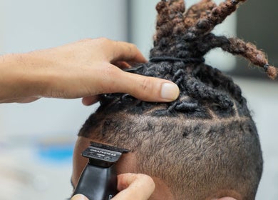Haircut in progress at Image Unisex Barbershop and Salon, Sicklerville, New Jersey, US.
