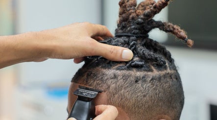 Haircut in progress at Image Unisex Barbershop and Salon, Sicklerville, New Jersey, US.