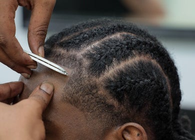 Hair styling at Image Unisex Barbershop and Salon, Sicklerville, New Jersey, US, showcasing detailed grooming.