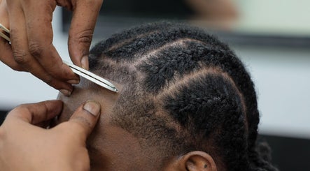 Hair styling at Image Unisex Barbershop and Salon, Sicklerville, New Jersey, US, showcasing detailed grooming.