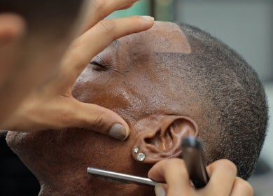 Close-up of a precise shave at Image Unisex Barbershop and Salon, Sicklerville, New Jersey, US.