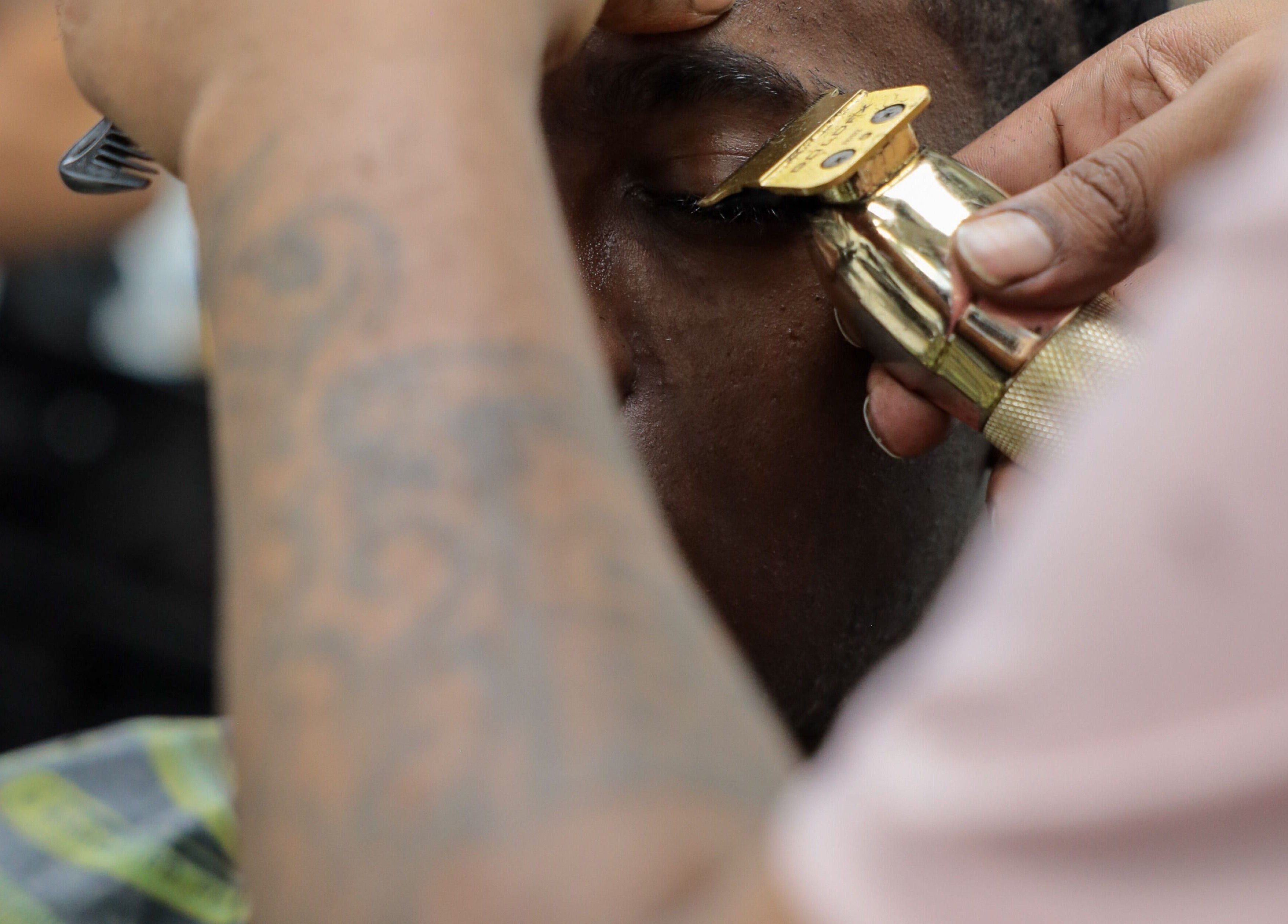 Professional eyebrow trimming at Image Unisex Barbershop and Salon in Sicklerville, New Jersey, US.