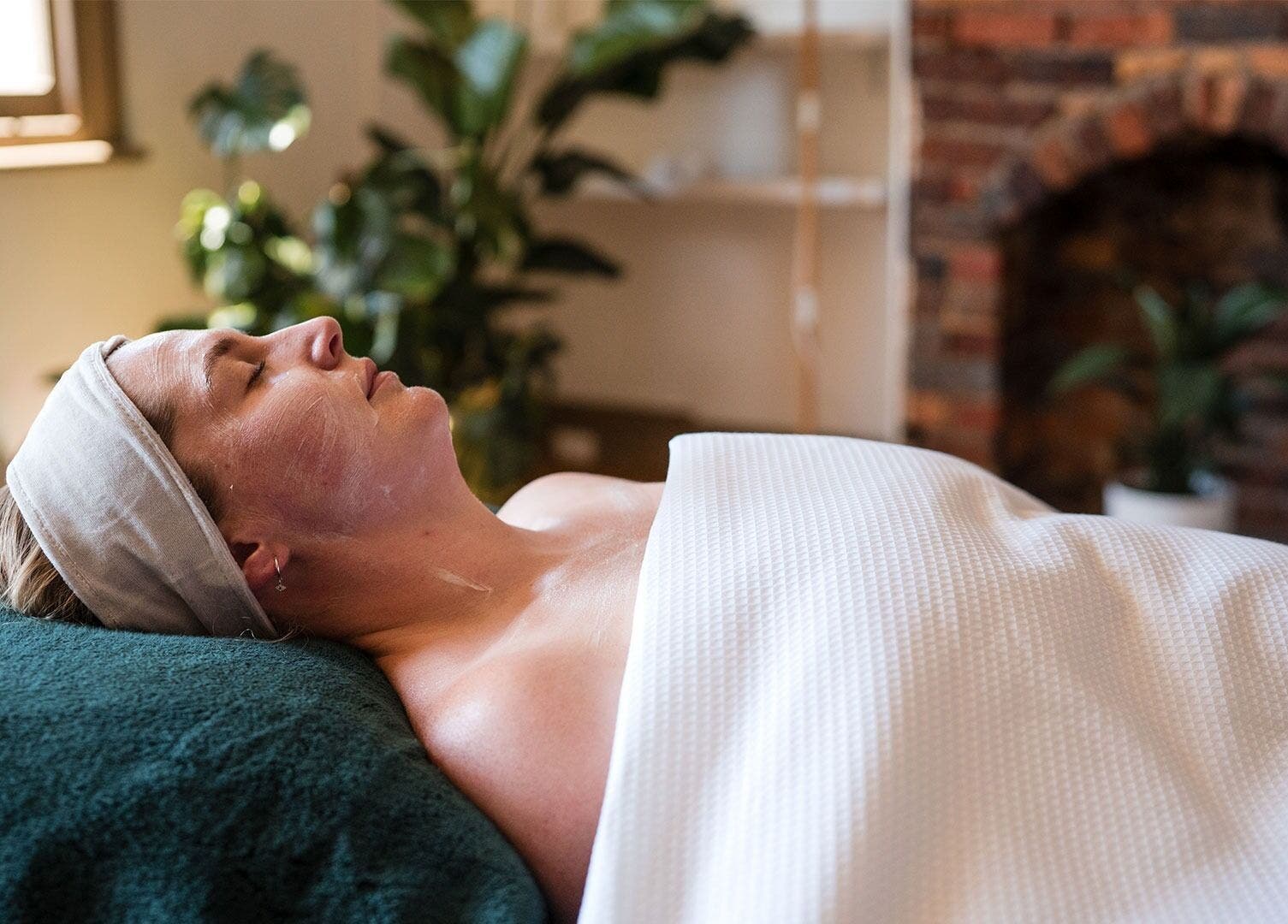 Client receiving a facial treatment at The Peaceful Skin Co, Melbourne, Victoria, AU.