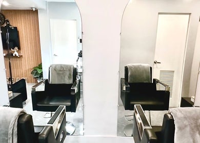 Modern salon setup at Marquess Beauty Lounge, Manila, Metro Manila, PH. Sleek styling chairs and mirrors.