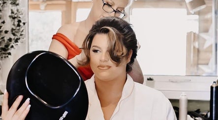 Professional hairstylist at KL Creative Hair @ Salon 22 in Enniskillen, NI, creating elegant updo.