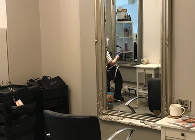 Elegant styling station at KL Creative Hair @ Salon 22, Enniskillen, Northern Ireland, GB showcasing modern decor.