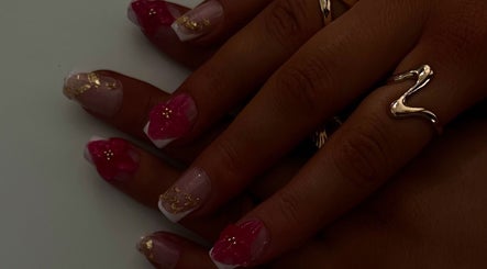 Elegant nail art with floral designs by NailsByKrista in Newmarket, England, GB.