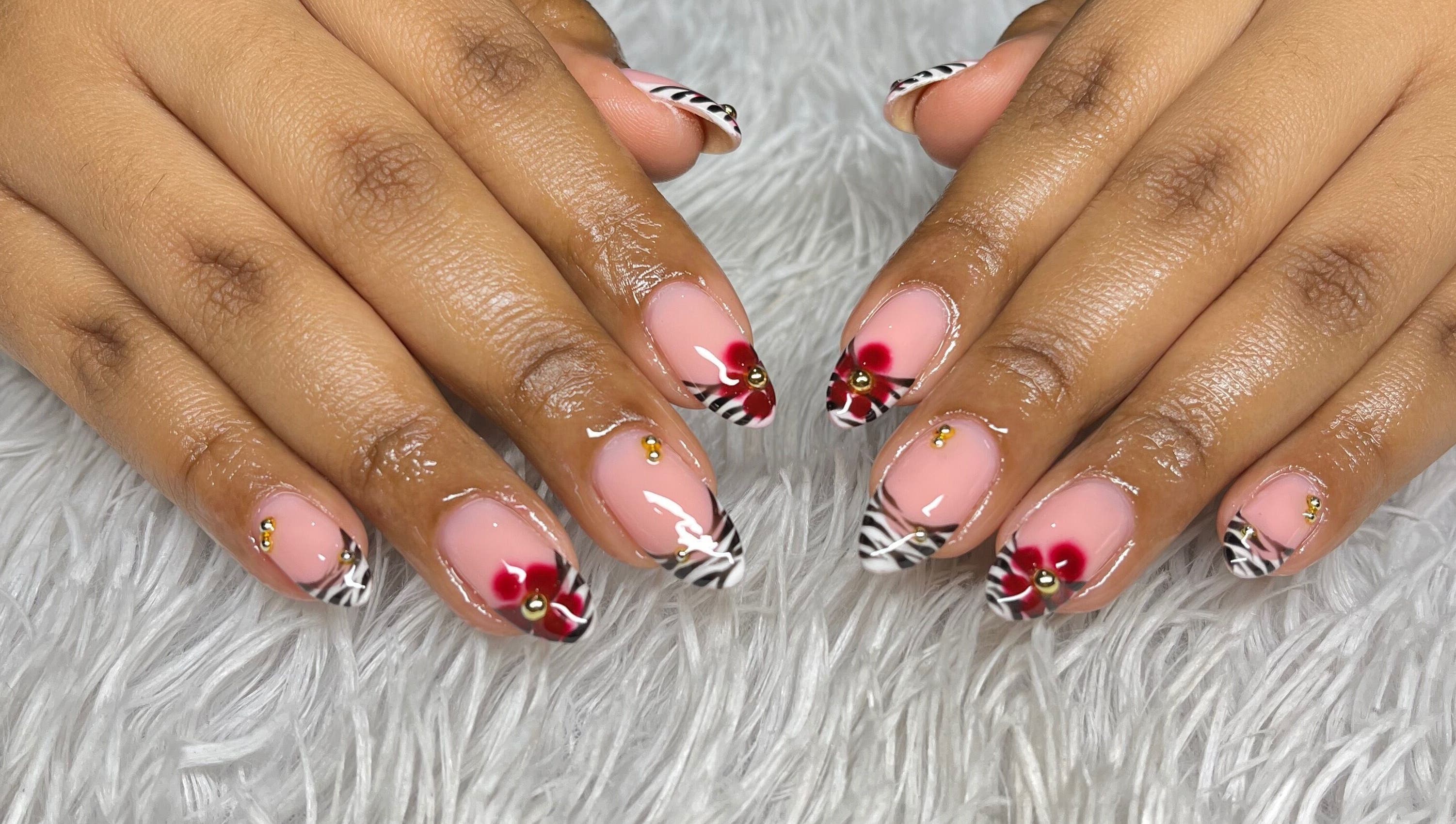 Nail art with zebra stripes and floral design at your.gelplug, Cape Town, Western Cape, ZA.