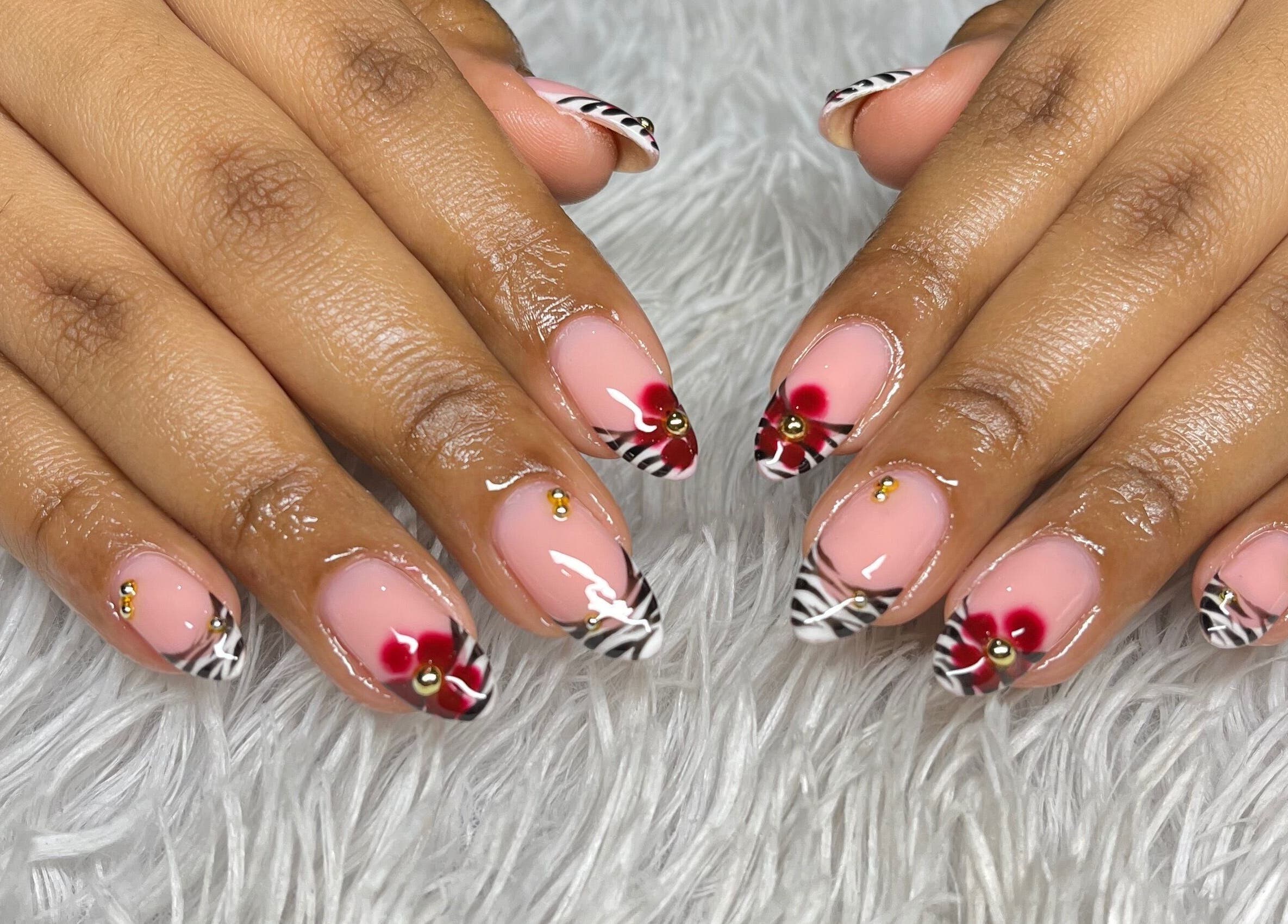 Nail art with zebra stripes and floral design at your.gelplug, Cape Town, Western Cape, ZA.