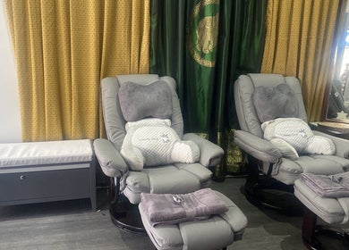 Comfortable armchairs and pillows at BuaKhonKaenThaiTherapies2, Nelson, England, GB.