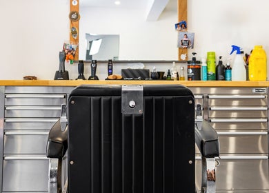 Dapper Man London barbershop chair, West Wollongong, New South Wales, AU. A sleek, modern styling area.