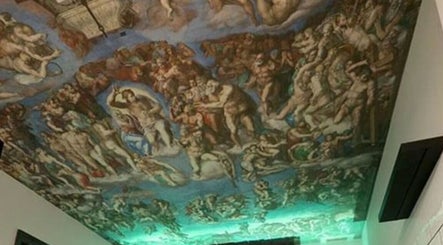 Artistic ceiling mural at Keir at Aldwick Hair, Bognor Regis, England, GB creates a unique ambiance.