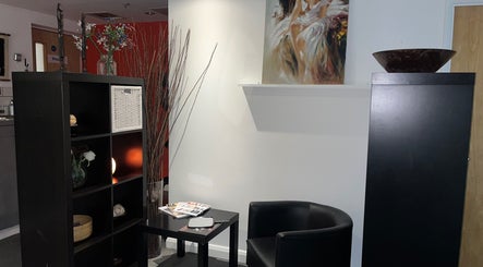 Cozy seating at Physio Edge Films, London, England, GB, with art decor and modern furniture.