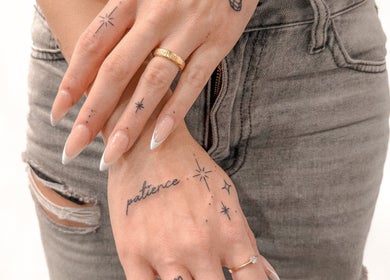 Elegant hand tattoos by Jay Soze Fineline Tattoo Artist, Peterborough, England, GB. Intricate stars and symbols.