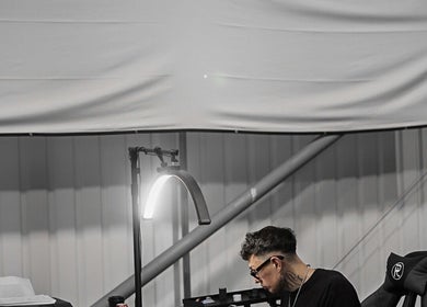 Jay Soze Fineline Tattoo Artist focused in studio, Peterborough, England, GB.