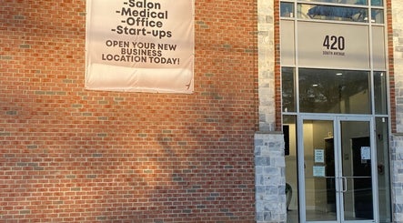 Thatgirl_Tiny venue entrance with brick facade in Staten Island, New York, US, offering space for salons and offices.