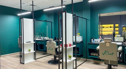 Interior of Janti Salon for Men, sleek styling chairs at Doha, Doha Municipality, QA.