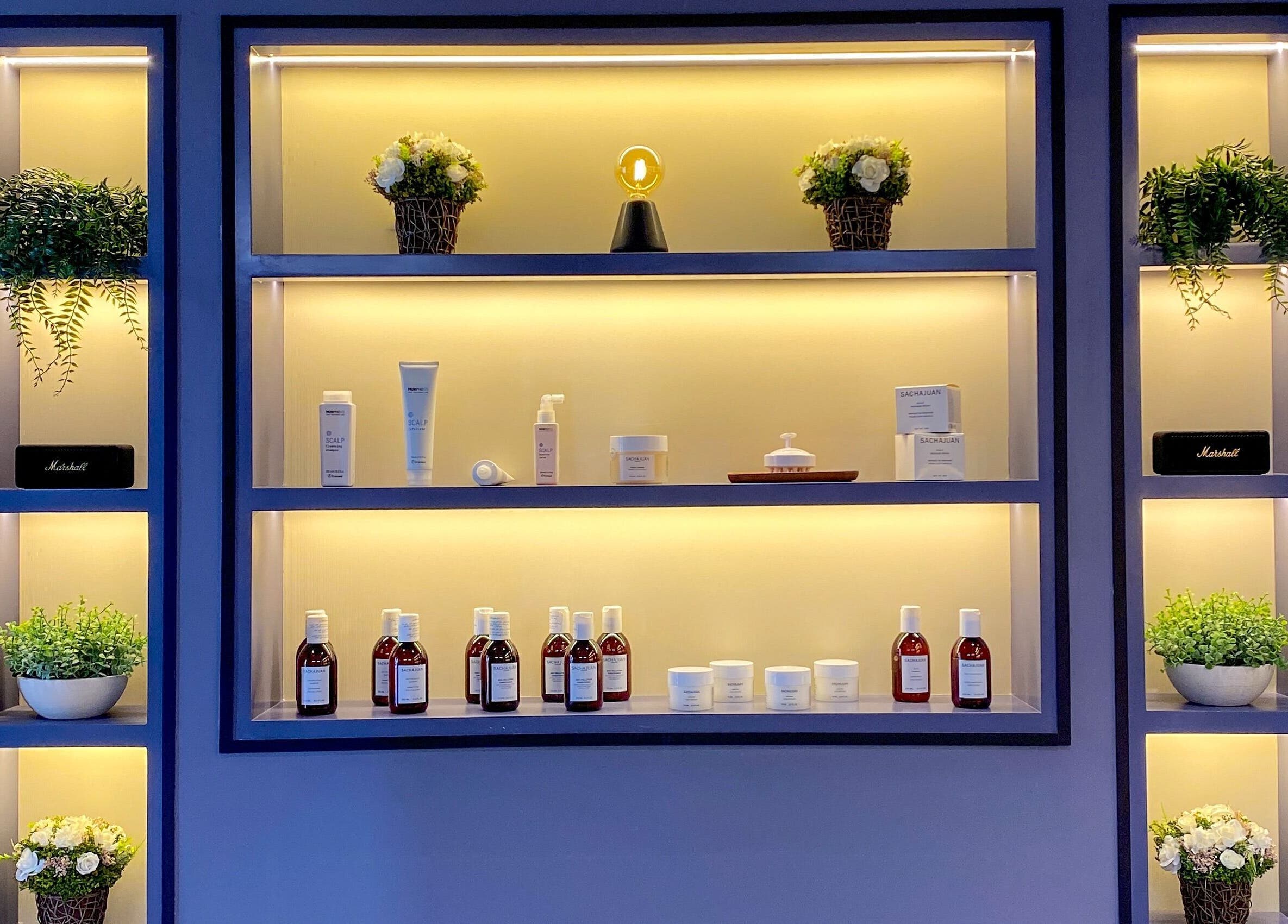 Elegant product display shelf at Janti Salon for Men, Doha, Doha Municipality, QA.