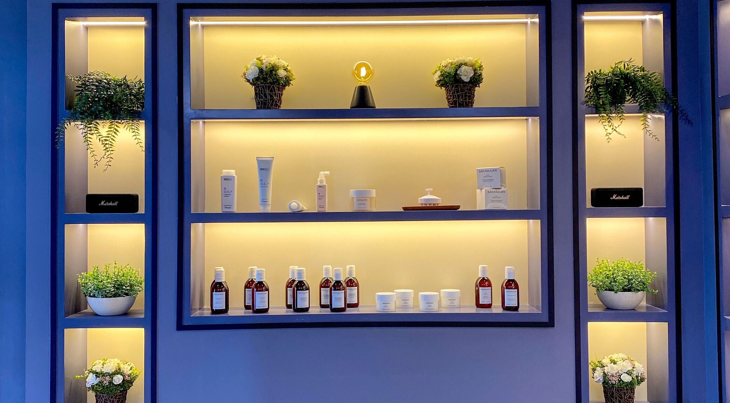 Elegant product display shelf at Janti Salon for Men, Doha, Doha Municipality, QA.