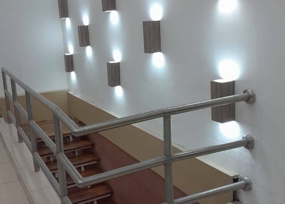 Modern stairway with stylish wall lights in Beauty Salon, San Pedro Sula, Cortés Department, HN.