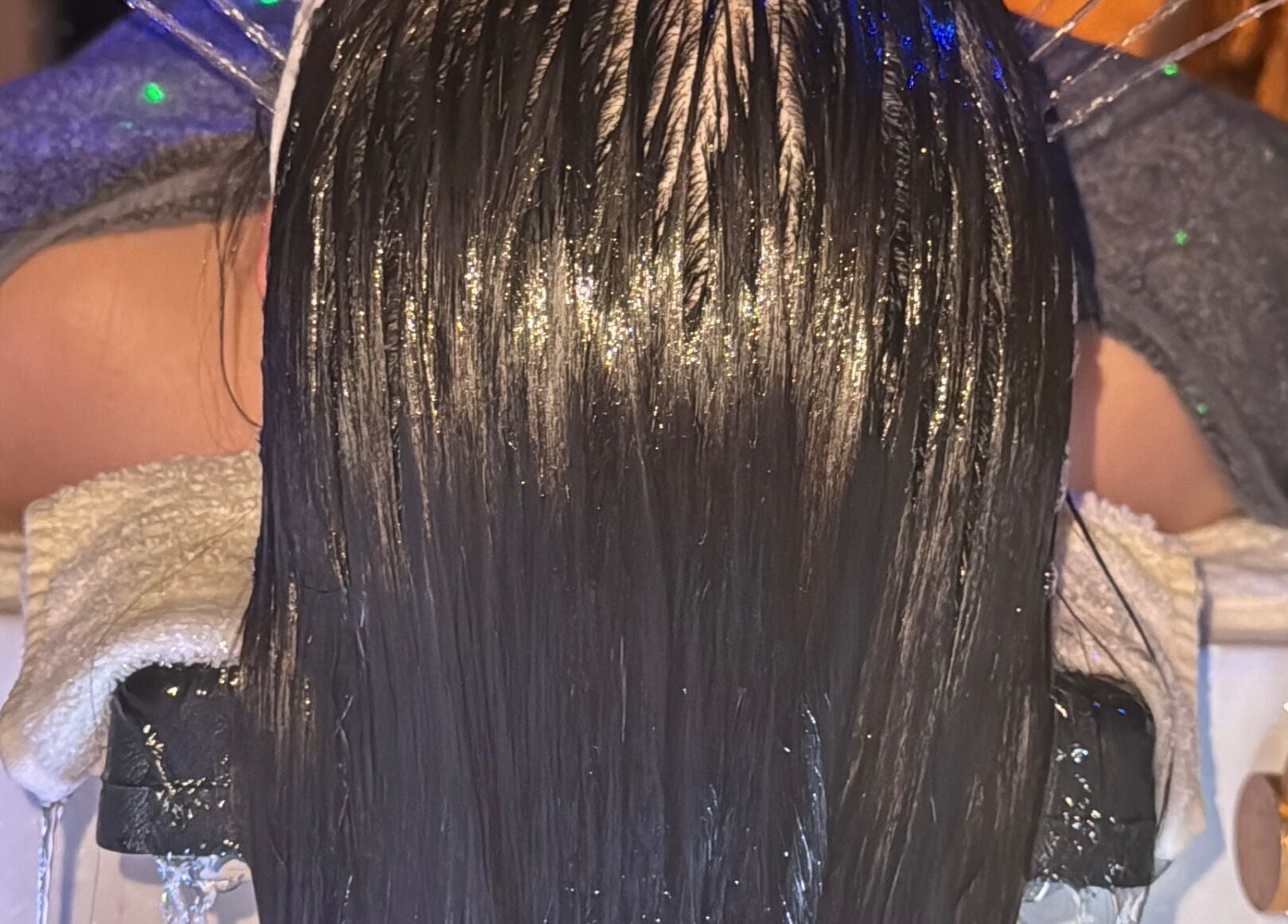 Relaxing hair treatment at GlowHeadSpa, San Pawl Il-baħar, MT, showcasing a luxurious scalp massage.