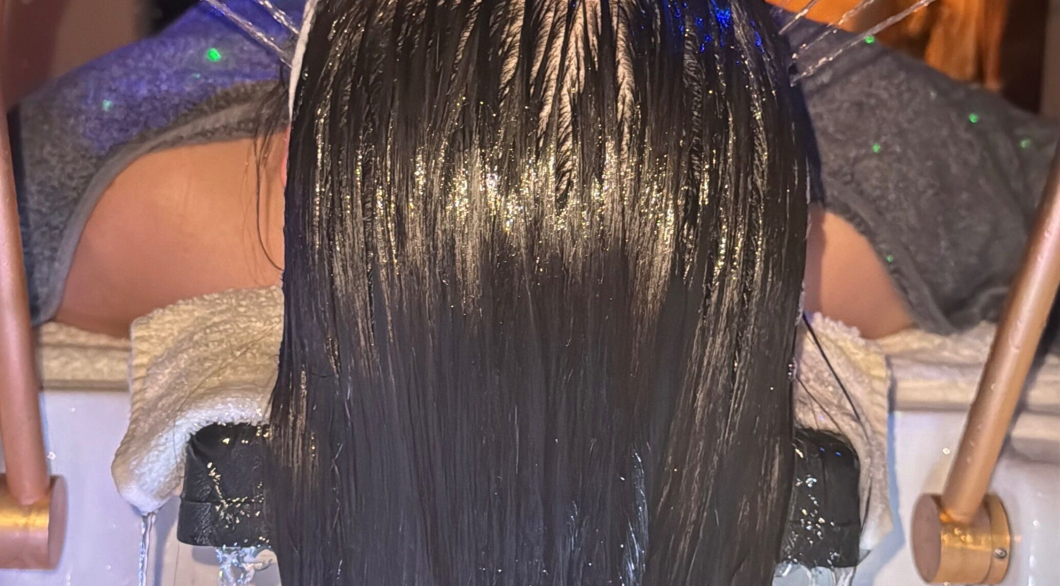 Relaxing hair treatment at GlowHeadSpa, San Pawl Il-baħar, MT, showcasing a luxurious scalp massage.