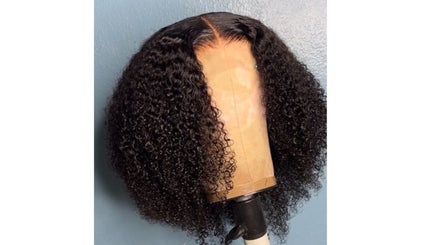 Curly wig styled by Crownedbycassie in Lauderhill, Florida, US. Enhancing natural beauty.