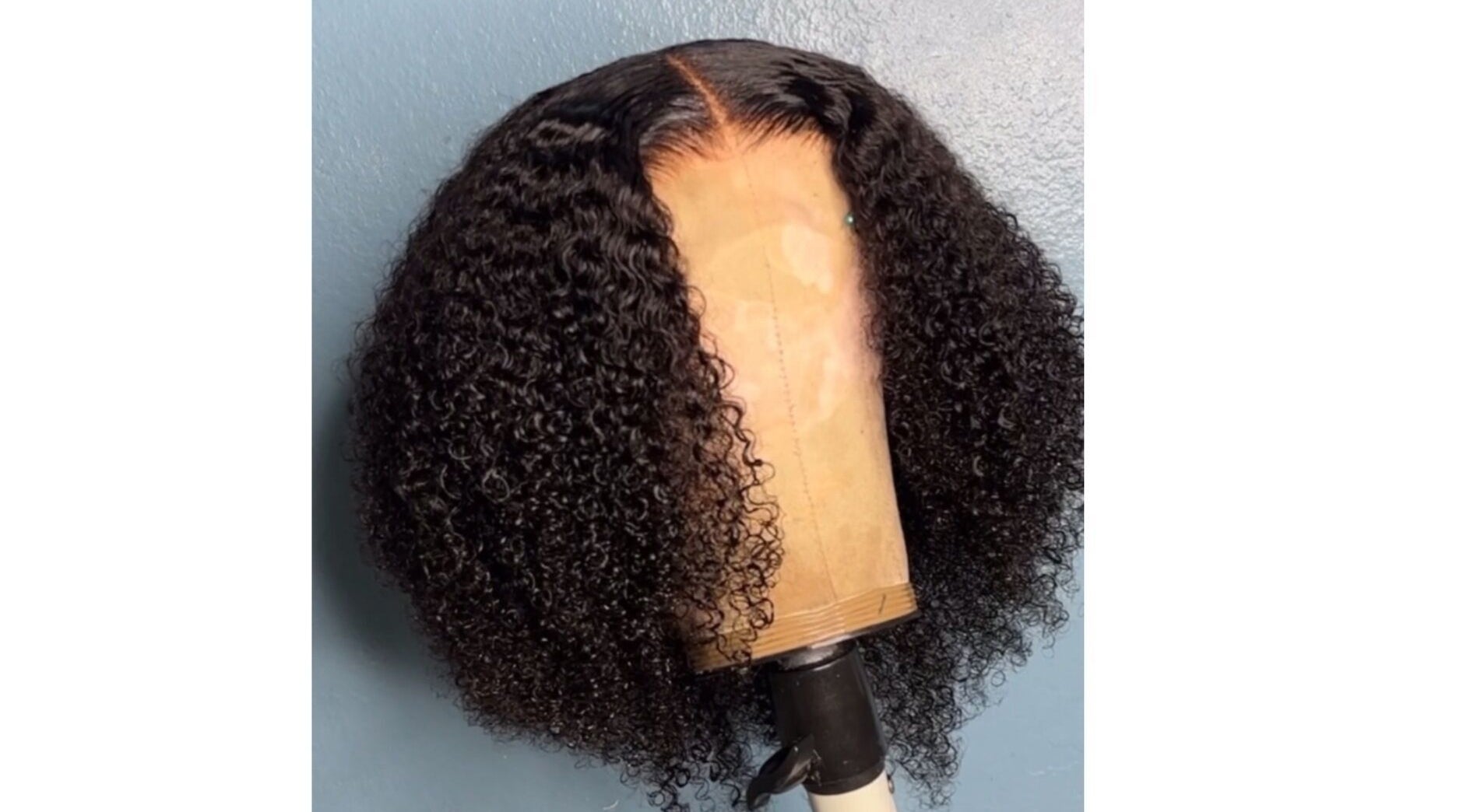 Curly wig styled by Crownedbycassie in Lauderhill, Florida, US. Enhancing natural beauty.