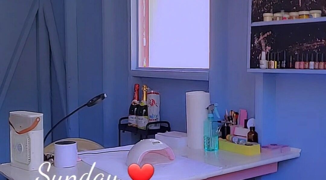 Cozy nail station at Beauty by Nicole, Grange Hill, Westmoreland Parish, JM with tools and decor.